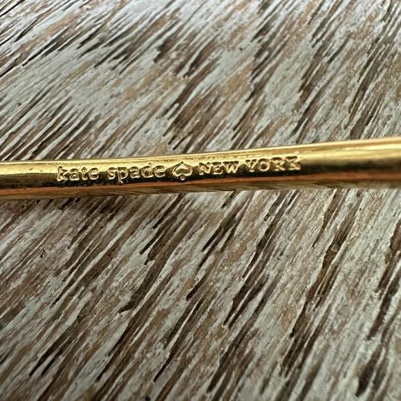 Kate Spade NY Gold Love Knot Bangle Bracelet - Picture 6 of 7